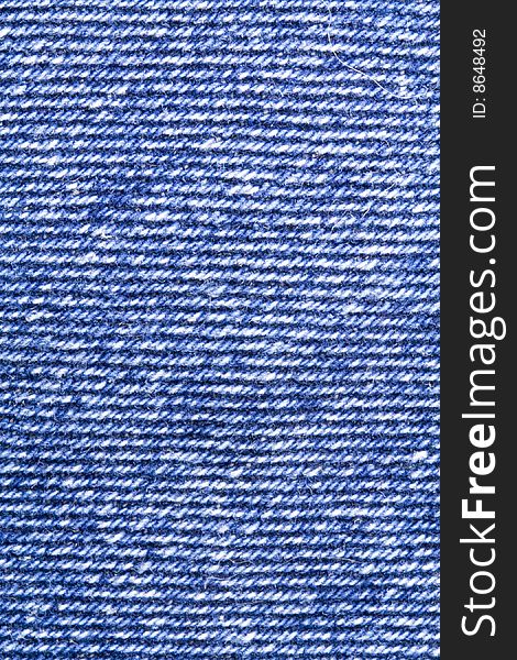 A close-up of the texture of blue jeans fabric. A close-up of the texture of blue jeans fabric