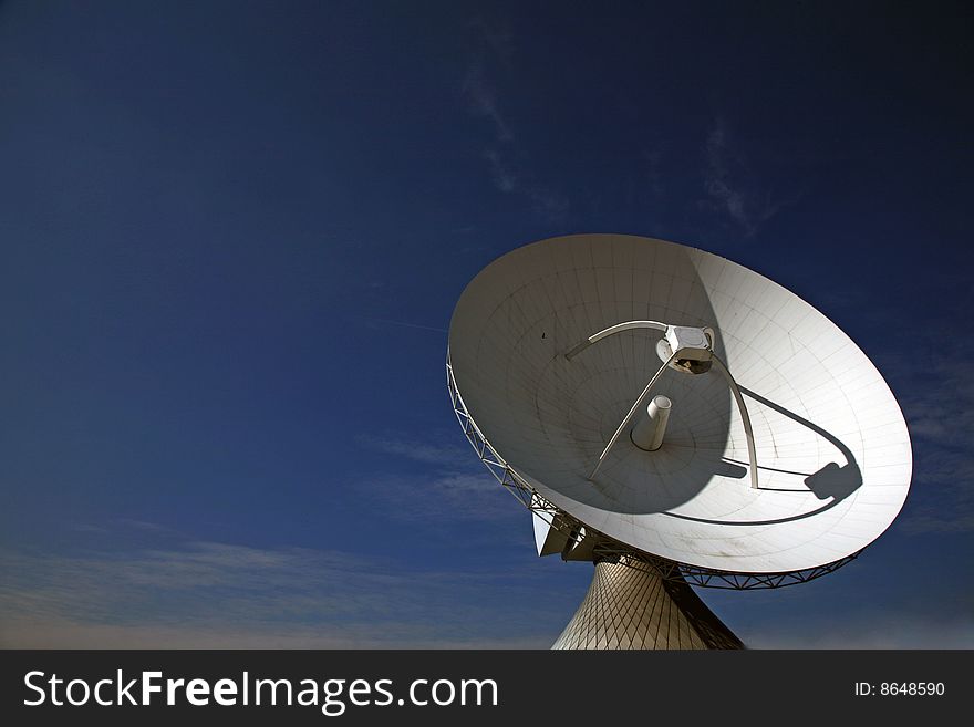 A radio telescope and blue sky, Germany