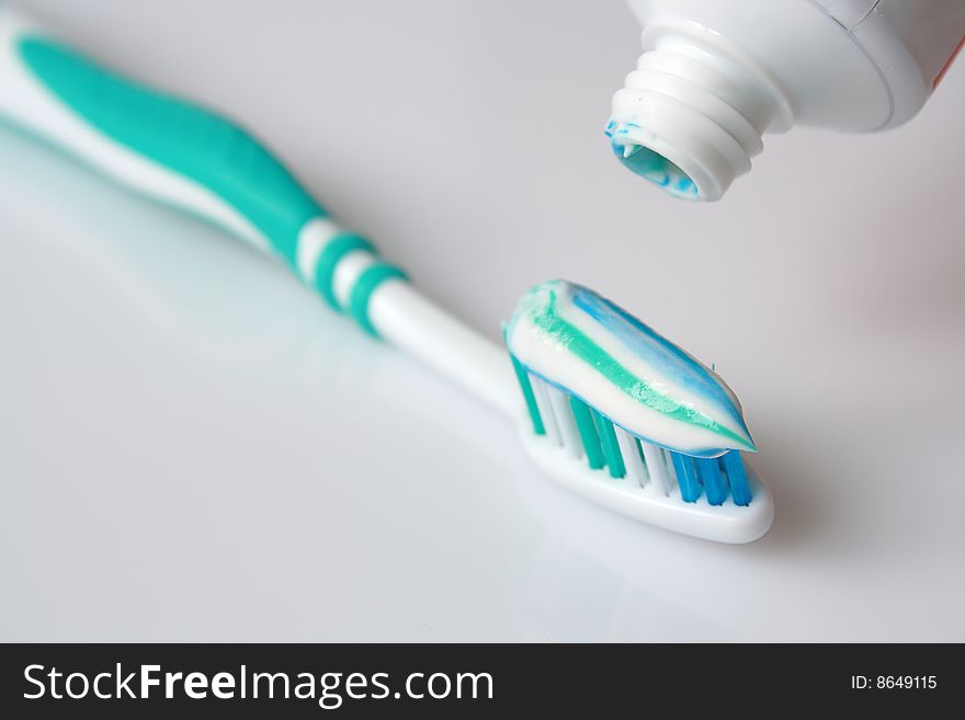Close-up pictuer of toothpaste and toothbrush