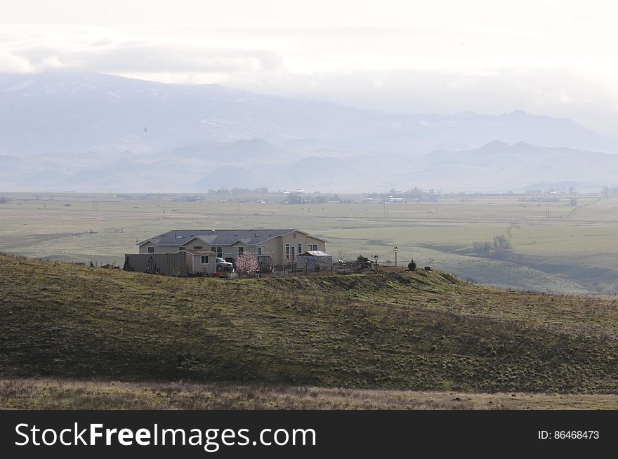 House On Hilly Farmland 1