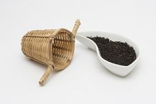Black Tea In Cup With Bamboo Sifter Stock Photos