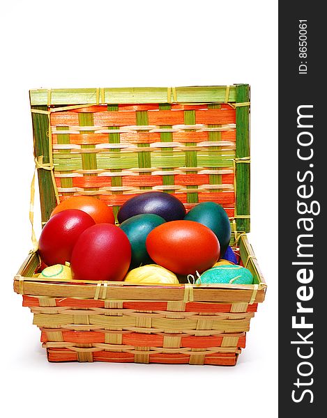 Colorful easter eggs in box isolated on white background