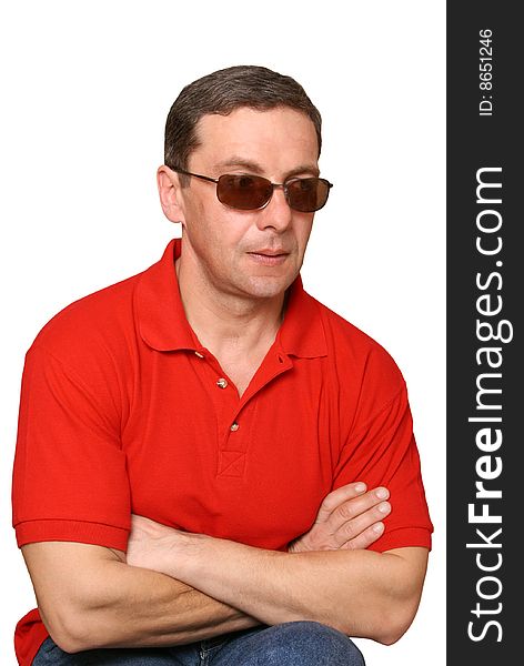 The man in dark glasses separately on a white background. The man in dark glasses separately on a white background