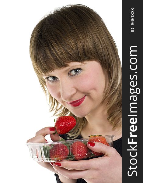 Young beauty woman hold plastic box of fresh strawberries