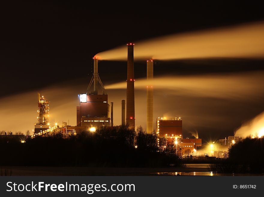 Factory smoke at night with long exposure effect