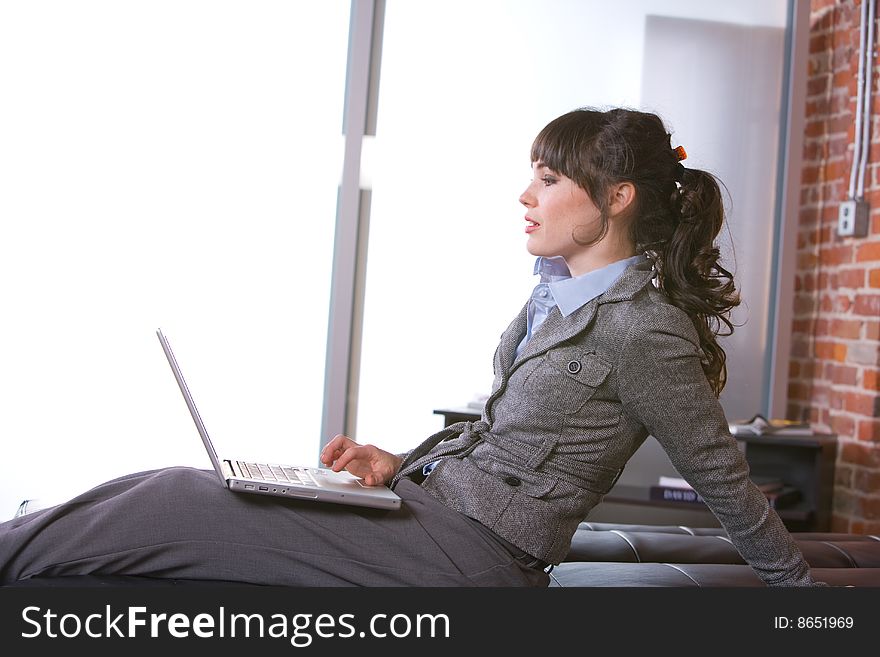 Business woman laptop in modern office. Business woman laptop in modern office
