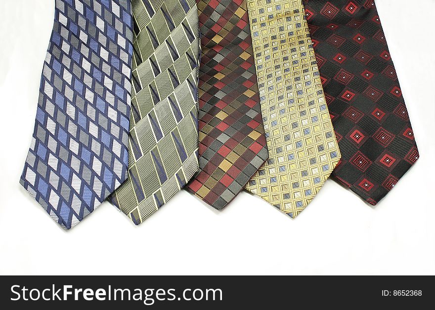 Different colored mens ties with a white background. Different colored mens ties with a white background.