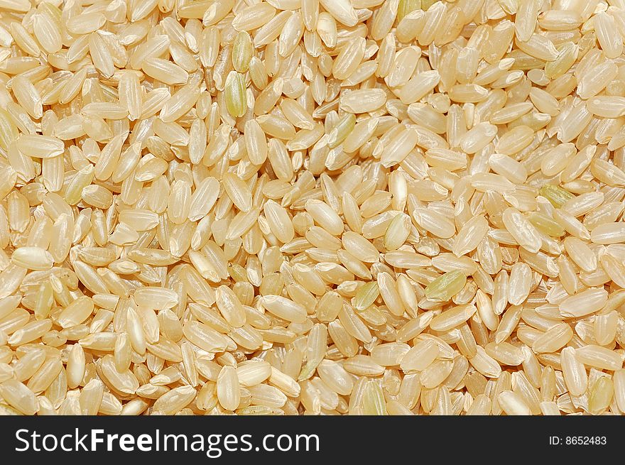 An image of brown rice.  Can be used as a background. An image of brown rice.  Can be used as a background.