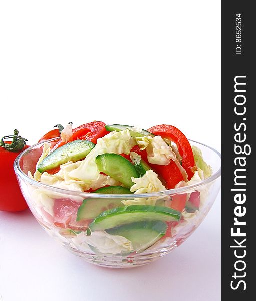 Fresh vegetable salad with tomato and cucumber isolated on white background