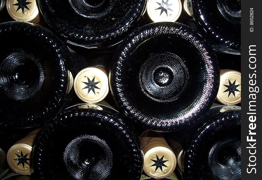 Wine bottles heap on in shelf