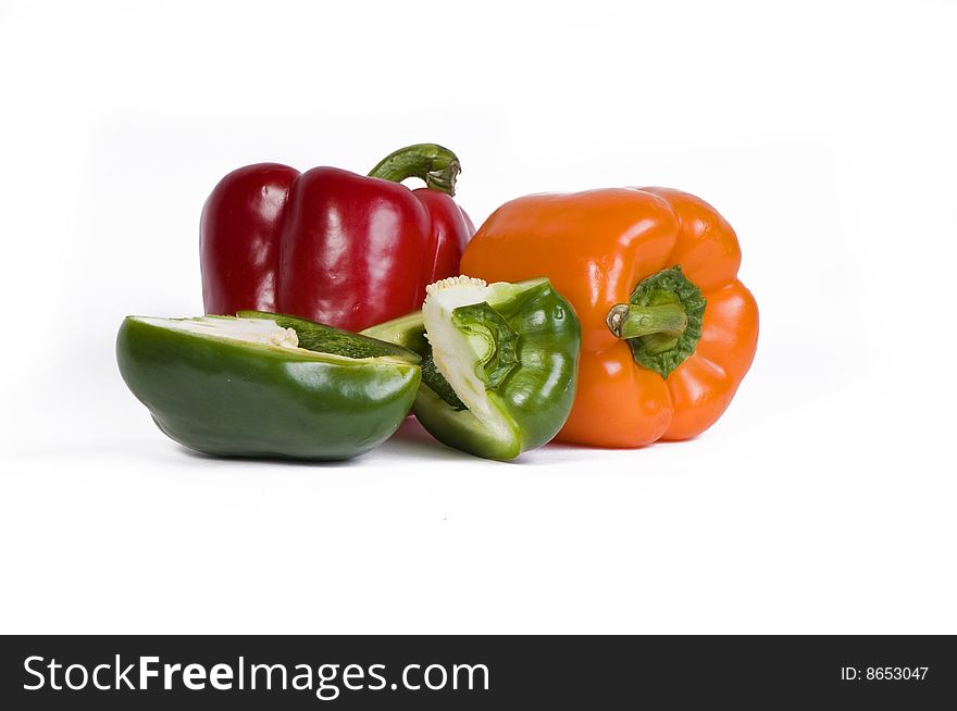 Three colored paprika isolated on a white background. Three colored paprika isolated on a white background