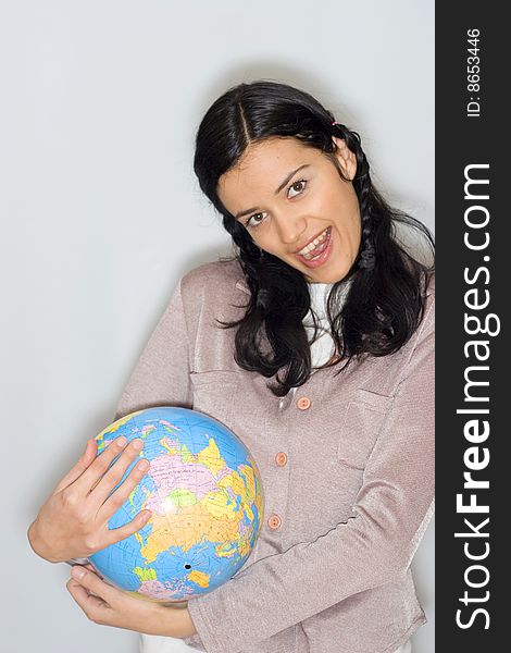 Young woman holding globe in her hands. Young woman holding globe in her hands
