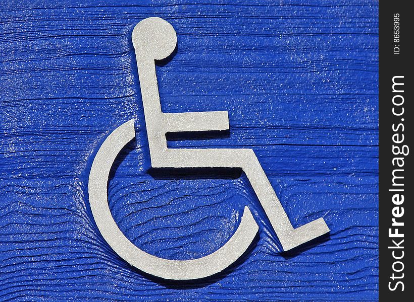 Standard Handicapped Parking Symbol Carved in Wood. Standard Handicapped Parking Symbol Carved in Wood.