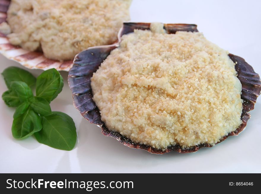 A meal of fresh mussels in decorative table ware