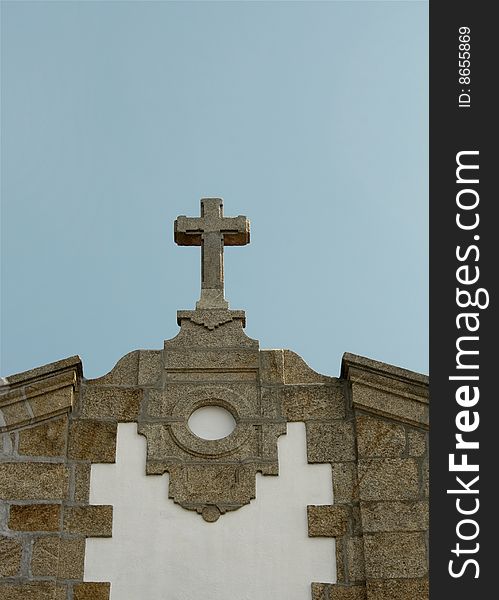 Church stone cross on a sunny day. Church stone cross on a sunny day