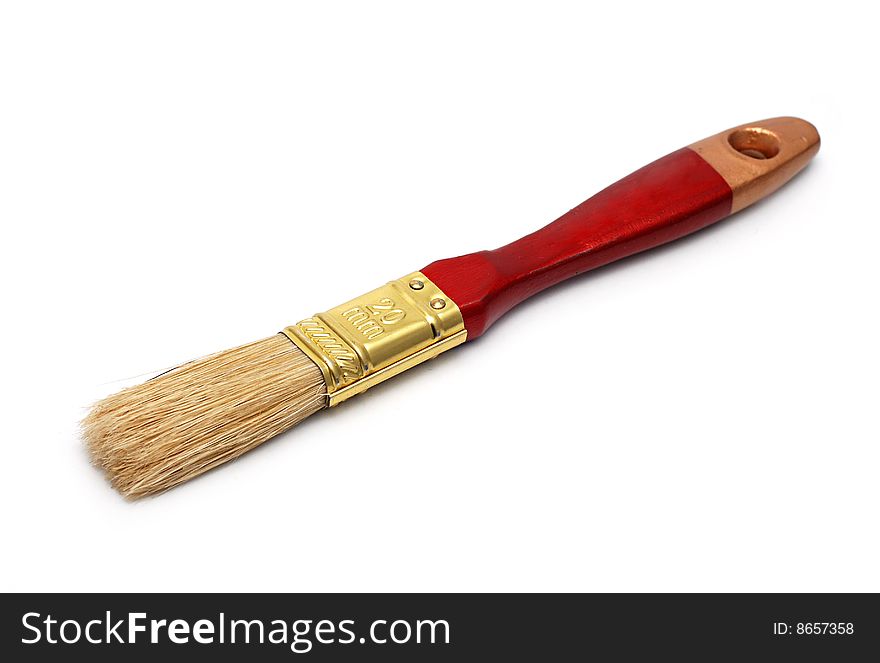 Paintbrush with red woodeh handle isolated over white background