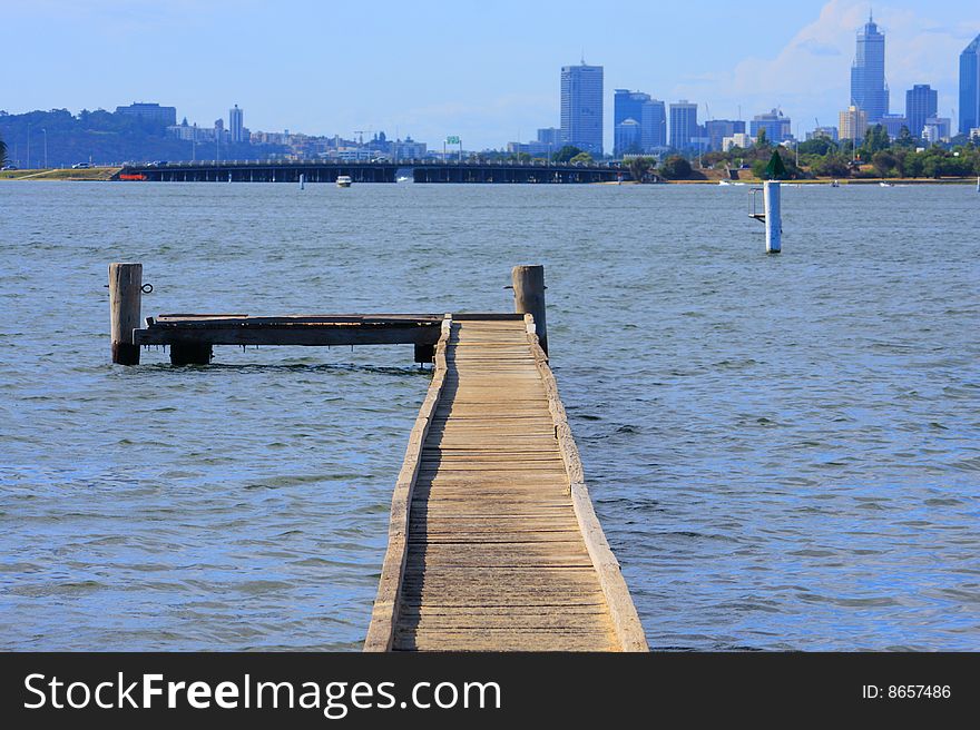 A wooden bridge at lake. A wooden bridge at lake