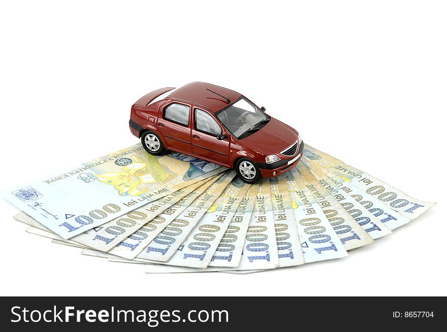 Small car on money against white background. Small car on money against white background