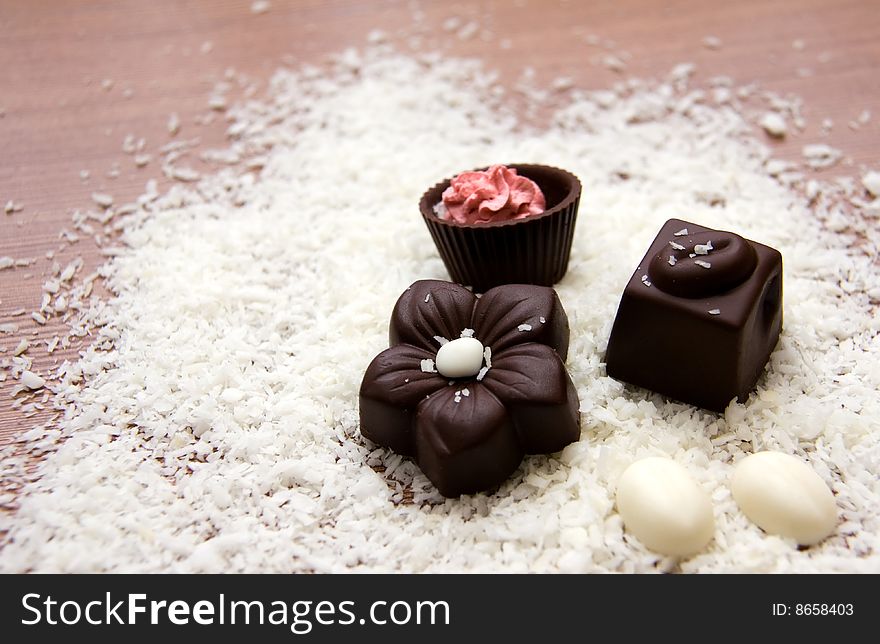 Chocolate Candies in Coconut Chips