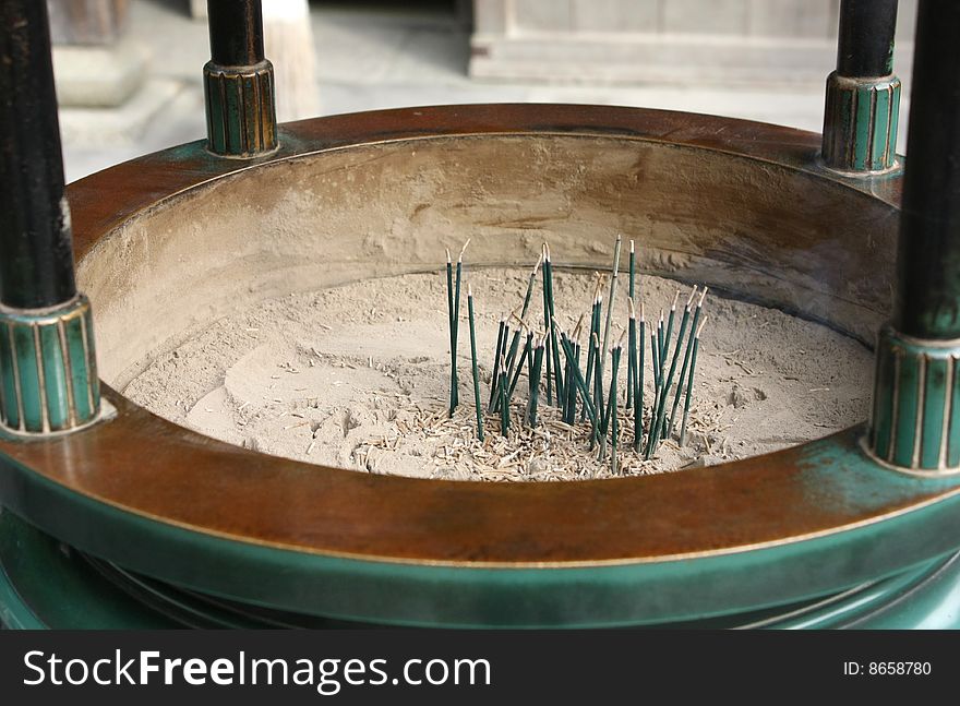 Aromatic Sticks in the Incense Burner