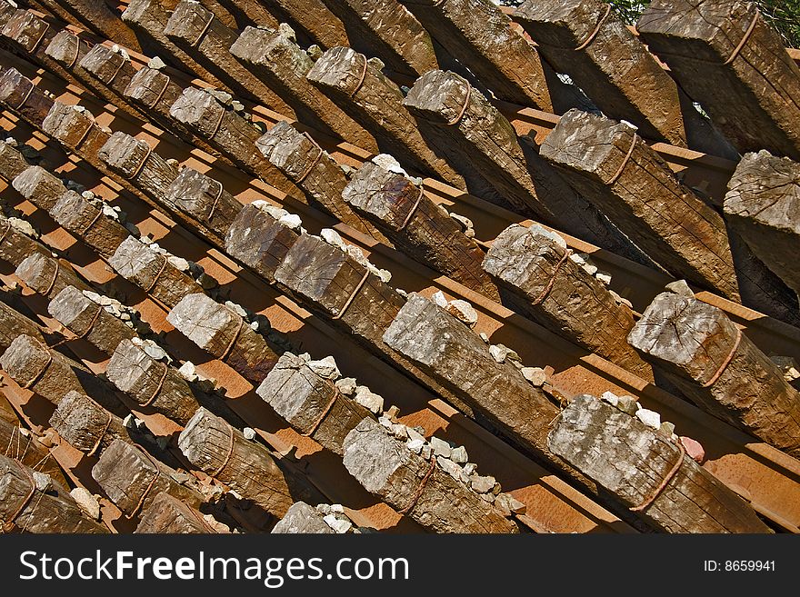 Wooden beams are stored for the railway