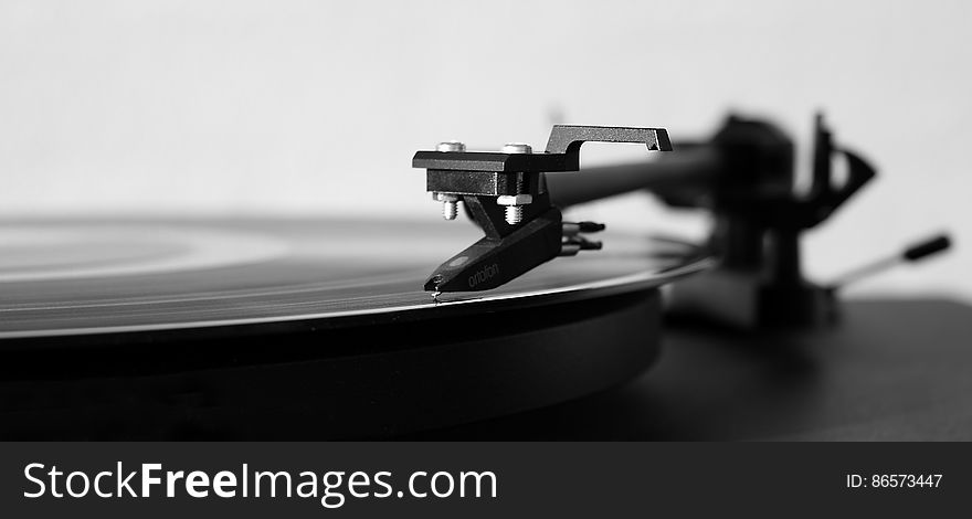 Gray Scale Photography of Turntable