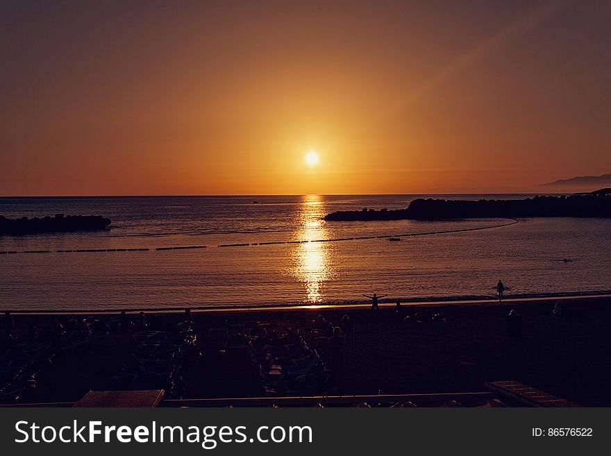 Scenic View Of Sea Against Sky During Sunset