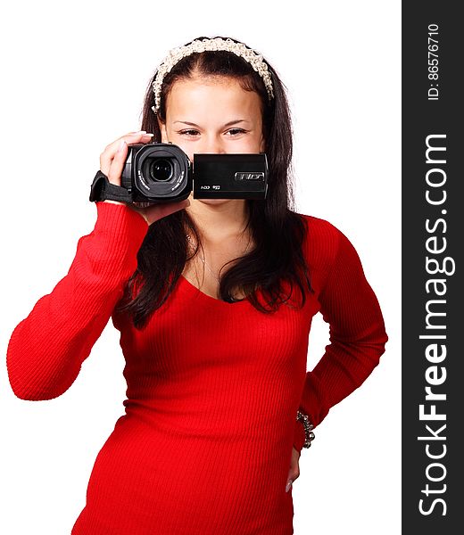 Woman Holding a Black Video Camera