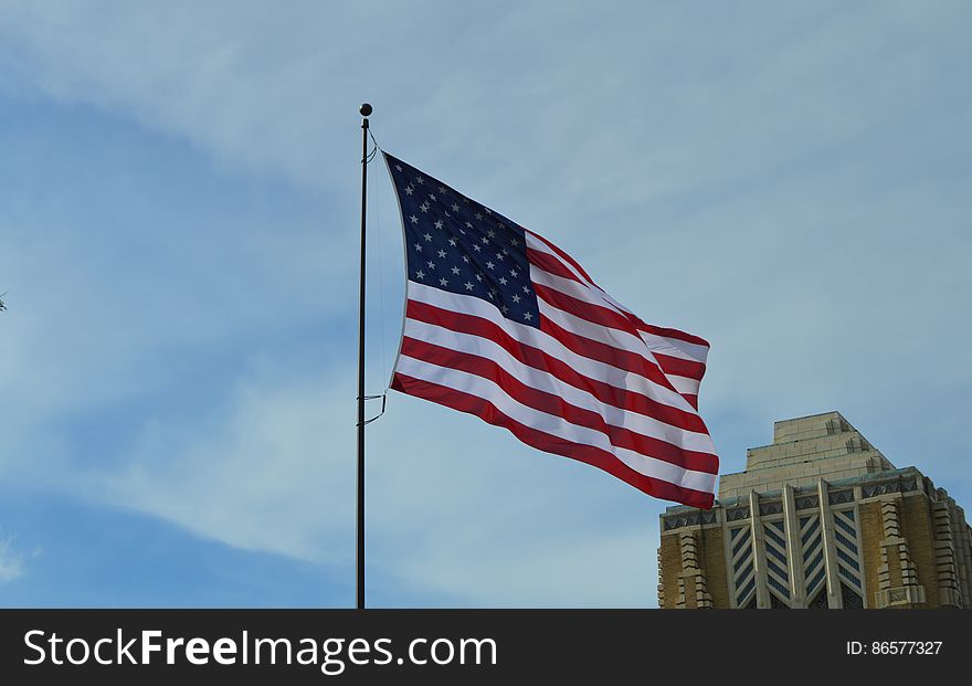 America Flag Under Blue Sky at Daytime