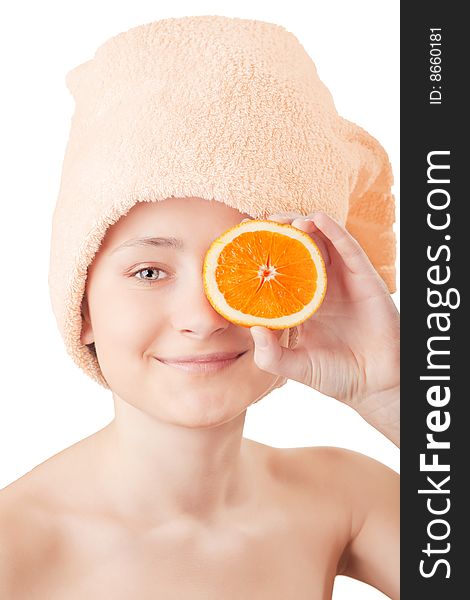 Pretty young girl with a an orange on white background