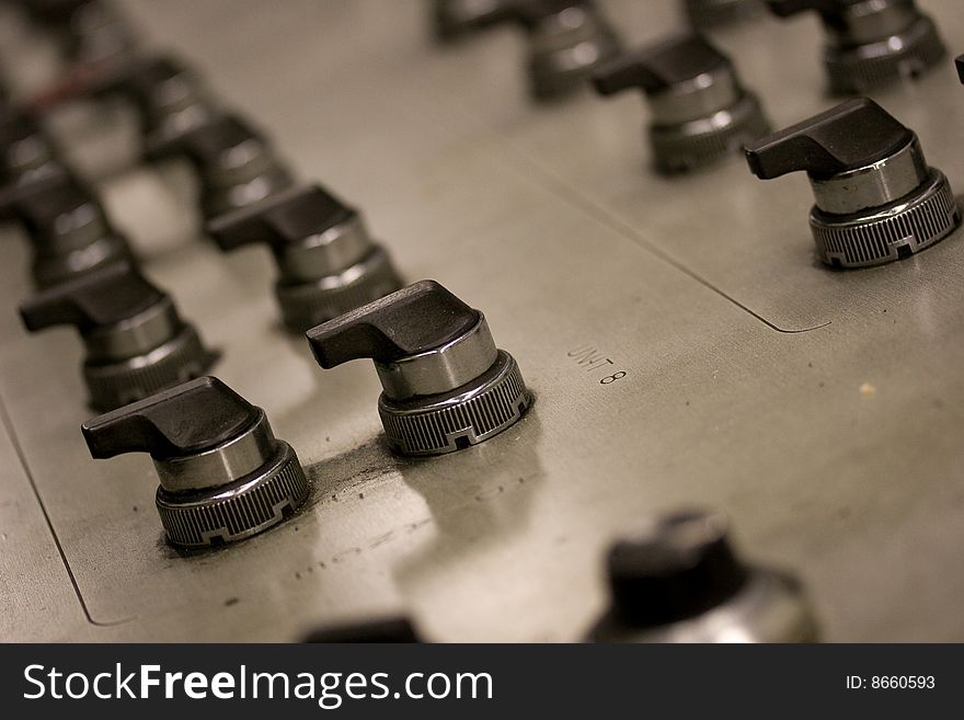 A closeup of an offset printing press control panel. A closeup of an offset printing press control panel.