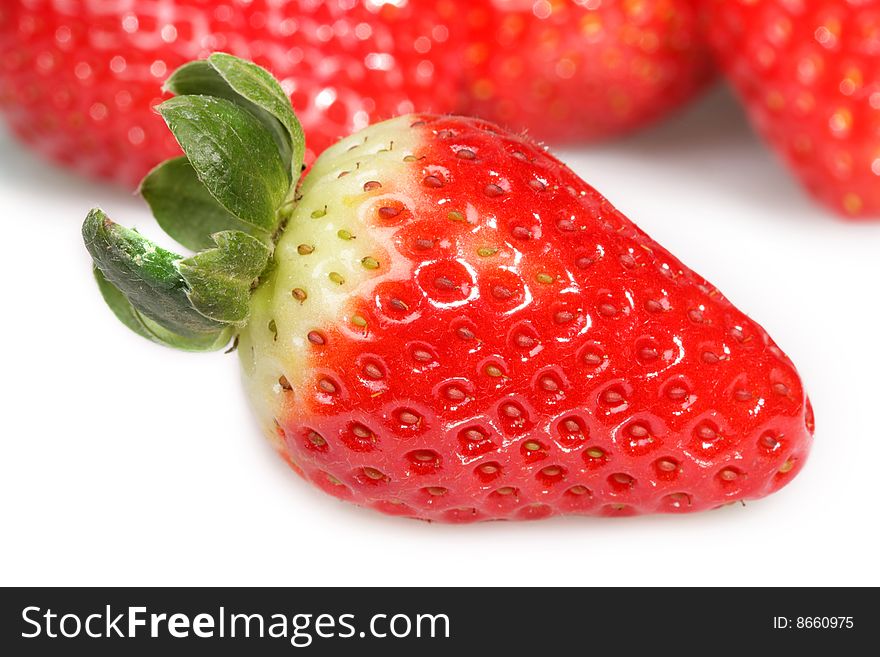 Ripe strawberries on a white background. Ripe strawberries on a white background.