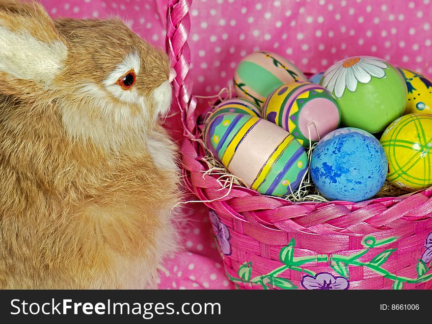 Easter bunny with eggs in basket. Easter bunny with eggs in basket.