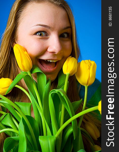 The beautiful girl with tulips