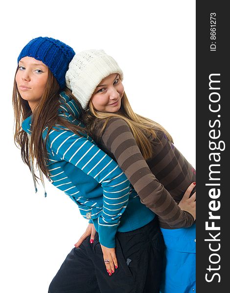 The two young attractive girls isolated on a white background