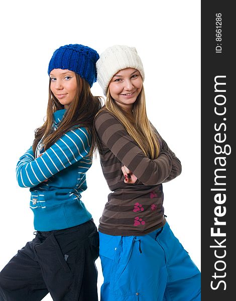 The two young attractive girls isolated on a white background