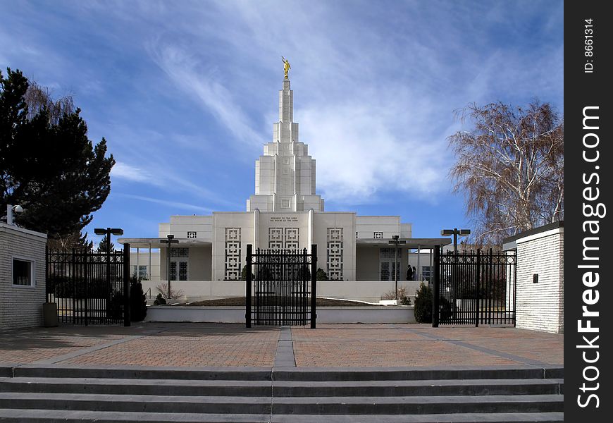 Mormon Temple with blue sky and clouds in background