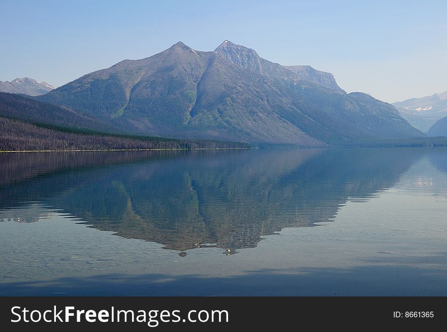 One of the mountains of Glacier National Park, reflected in the lake