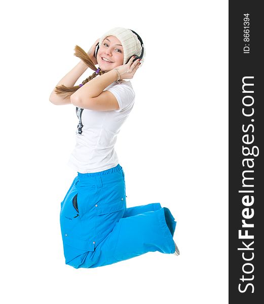 The young girl with a headphones isolated on a white background