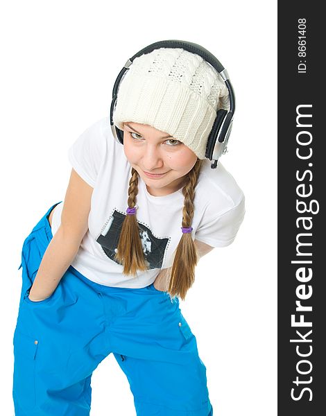 The young girl with a headphones isolated on a white background