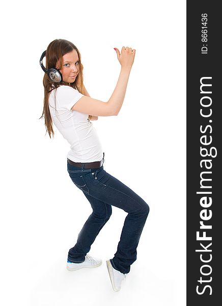 The young girl with a headphones isolated on a white background