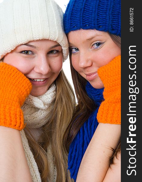 Two attractive girls isolated on a white background