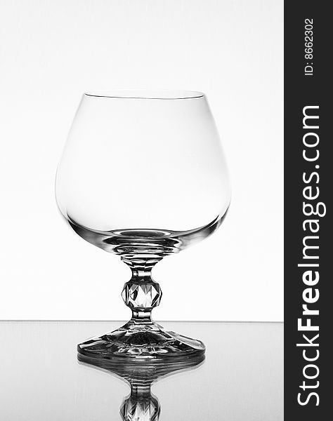 Tall wine glass on light background