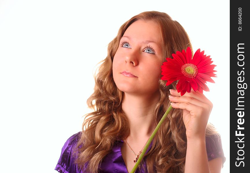 Girl and red flower on white