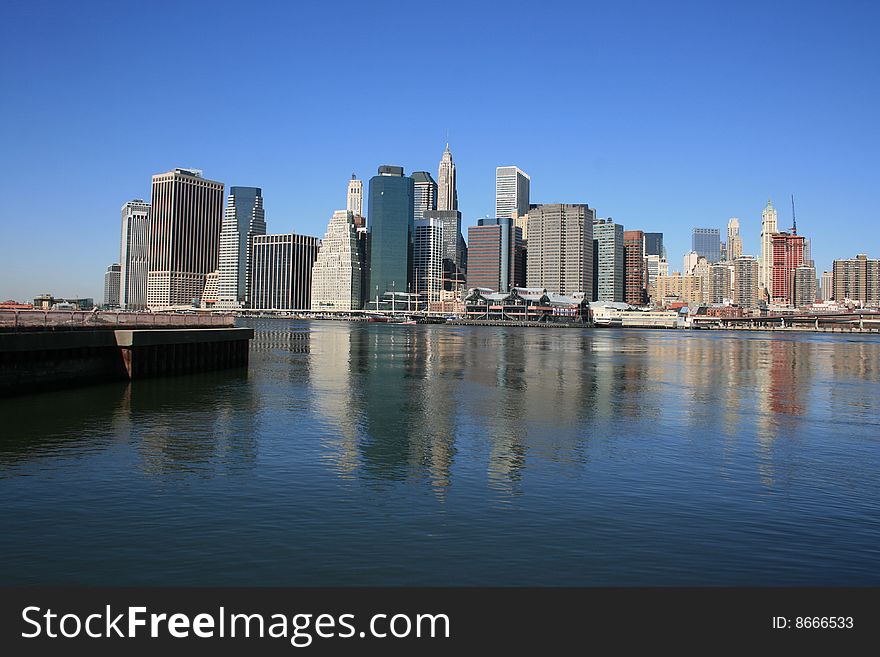 Lower Manhattan skyline along the East River. Lower Manhattan skyline along the East River.