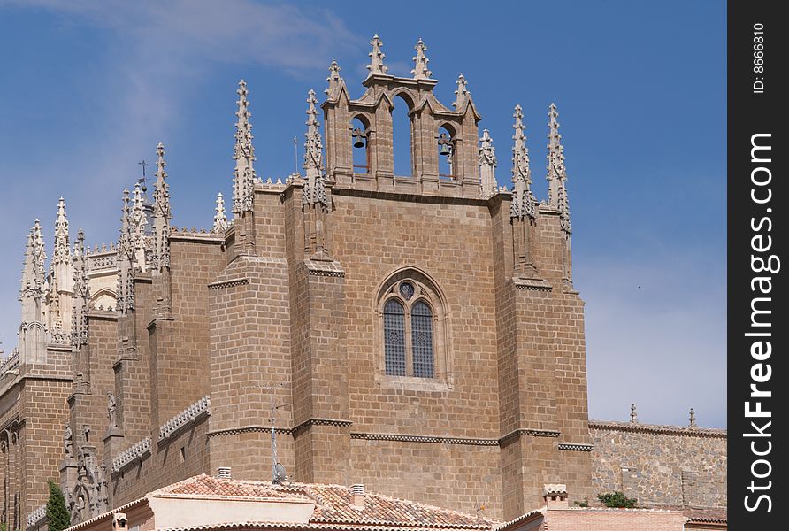 Fragment of the old building of gothic style with pinnacles