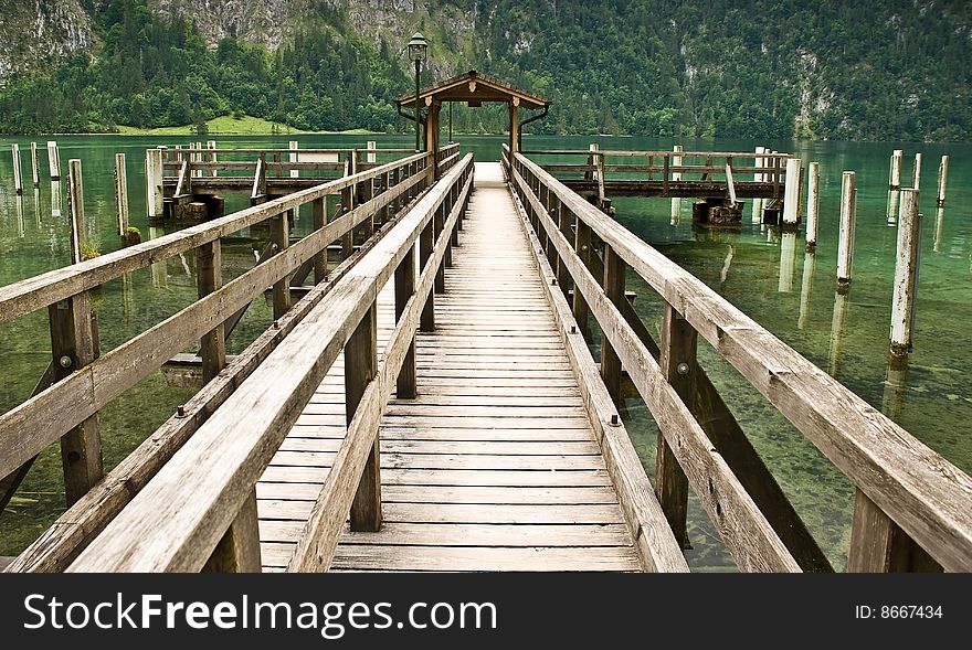 Pier on a lake in Bavarian Alps