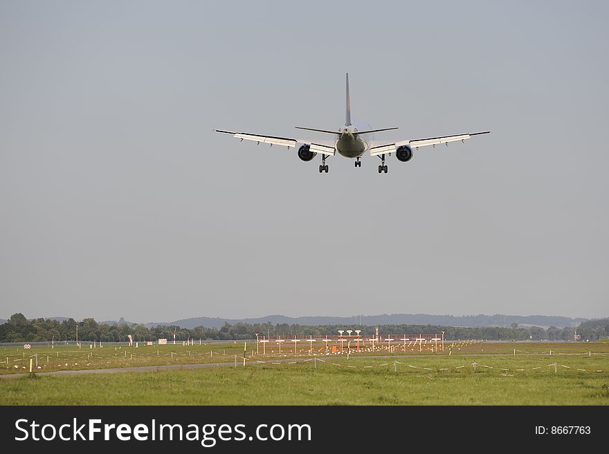 An airplane is landing at airport munich in germany