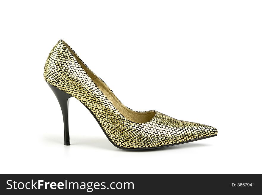 Golden shoe, isolated on white