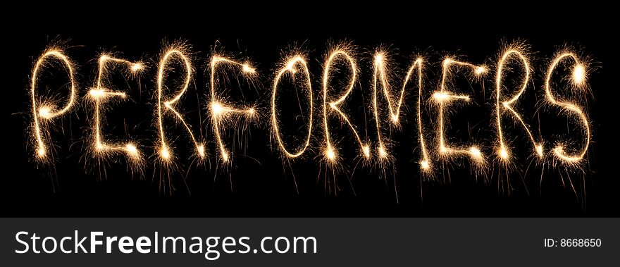 Word performers written sparkler on dark